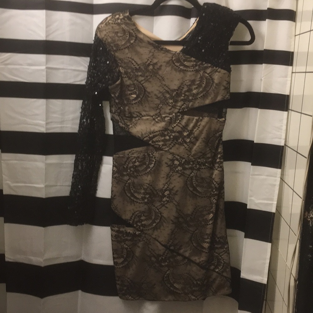 Bebe one sleeve lace cut out mini dress. Size S